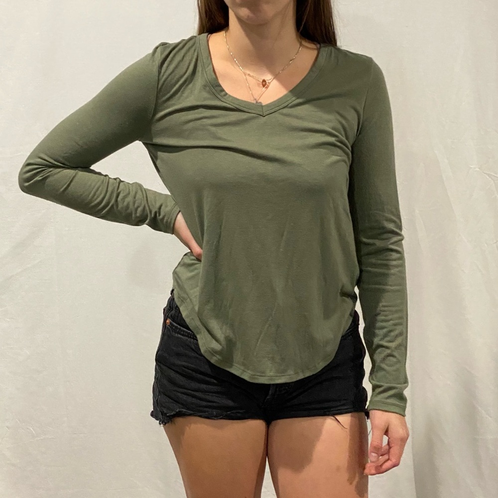 Cute green women’s long sleeve top.
